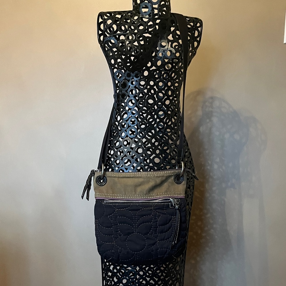Fossil Ker-Per Black and Tan Crossbody Bag. Purple interior.